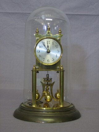 A German 400 day clock complete with glass dome