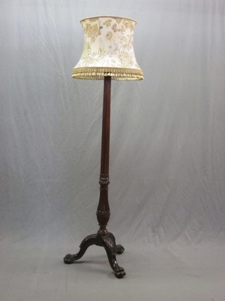A 19th Century turned and reeded torchere converted for use as an electric standard lamp