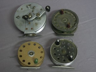 An Intrepid centre pin fishing reel 3 1/2", an Oriental centre pin fishing reel and 2 others (f)