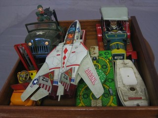 A battery operated tin plate model of a vintage car, tin plate model boat and a collection of other tin plate items