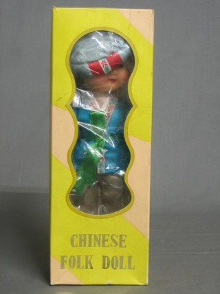 A Peoples Republic of China doll, boxed