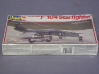 A Revell model of a Lockheed F-104 Star Fighter, boxed and unmade
