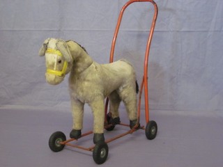 A Lines Bros. push-a-long figure of  a donkey