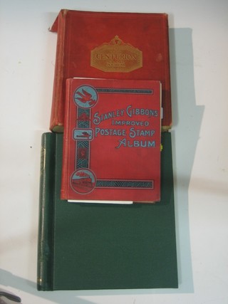 A Centurion stamp album, a Stanley Gibbons improved postage stamp album and a green stamp album