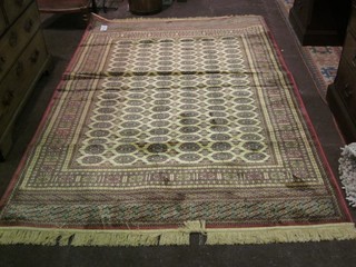A Belgian cotton yellow ground Bokhara style carpet 91" x 59"
