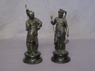 A pair of spelter figures in the form of a lady and gentleman 12"