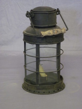 A 19th Century iron hand lantern 12"