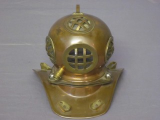 A miniature reproduction Victorian copper diver's helmet 9"