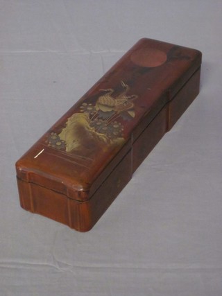 A rectangular red lacquered glove box with hinged lid 11"