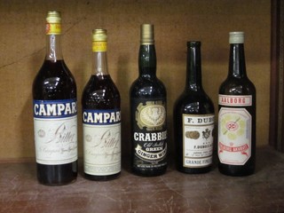 A litre bottle of Campari, a bottle of Crabbies Ginger wine, a bottle of Aalbrog and a bottle of F Bueois Grand Vin Cognac