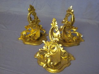 A pair of carved gilt wood painted brackets 10" and 1 other