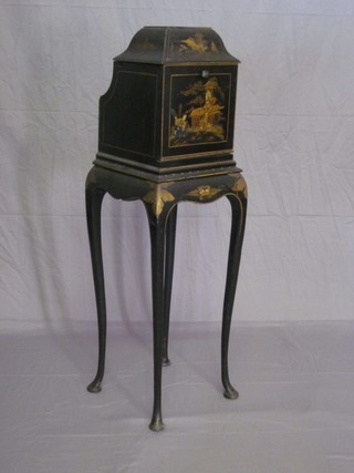 A 1930's lacquered chinoiserie telephone valet, raised on cabriole supports 10"
