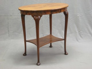 A Queen Anne style oval walnut occasional table, raised on cabriole supports with undertier 29"