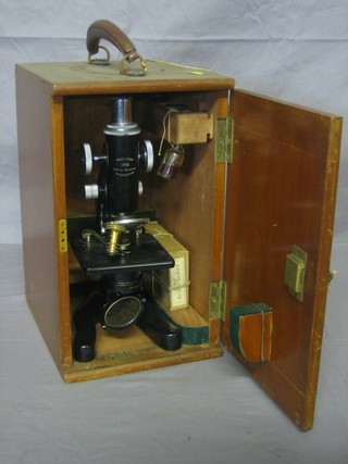 A Precision 1382 microscope by Flatters & Garnett Manchester
