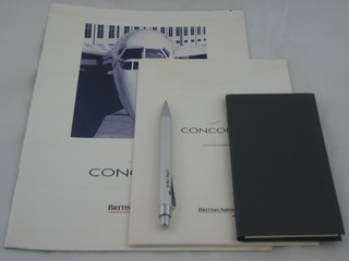 A Concord note book, Concord stationery and other Concord items contained in a blue folder