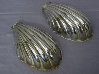 A pair of chromium plated scalloped lamp shades