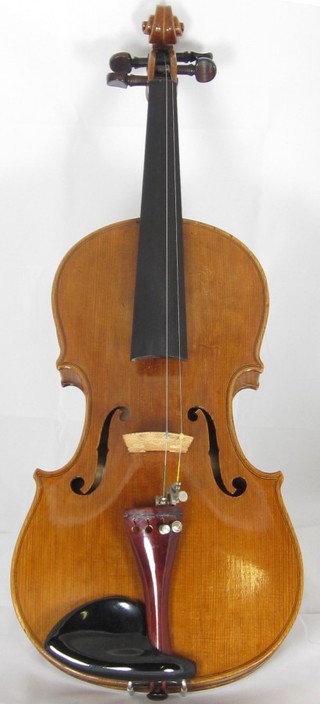 A violin with 2 piece back 14 1/8" by Giuseppe Ornati Fece In Milano Anno 1923, contained in an Edward Withers wooden carrying case ILLUSTRATED