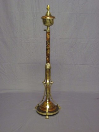 A Victorian pottery and brass mounted adjustable oil lamp stand, converted to electricity (some damage)