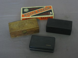 A Rolls razor and 3 other vintage razors