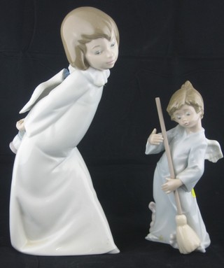 A Lladro figure of a winged standing boy with broom (wings f) 6" and a ditto figure of a girl (f)