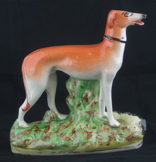 A 19th Century Staffordshire figure of a standing grey hound 6" ILLUSTRATED