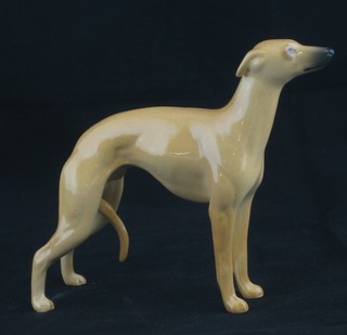 A Beswick figure of a standing whippet/grey hound 4 1/2"
