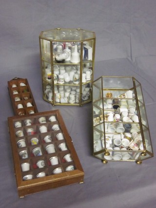 A large collection of various thimbles