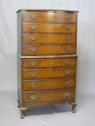A Queen Anne style walnut bow front chest on chest, the upper section fitted 4 long drawers, the base fitted 4 long drawers and raised on cabriole supports 31"