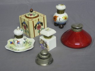A Royal Doulton flambe circular inkwell 4" with silver lid, together with 3 porcelain inkwells, a pottery inkwell and a metal inkwell