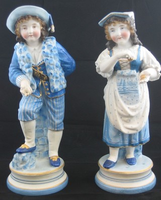 A pair of 19th Century Continental biscuit porcelain figures of boy and girl (boys fingers chipped)