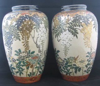 A pair of Oriental vases with floral decoration, the base with 4 character mark 11" THIS LOT HAS BEEN WITHDRAWN