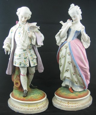 A pair of 19th Century Continental biscuit porcelain figures - The Love Letter depicting standing lady and gentleman 14" (f and r)