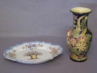 An oval shaped faience dish 14" and a pottery club shaped vase 11"