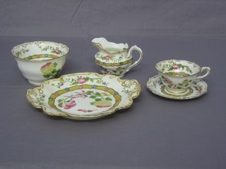 A 44 piece Crescent China floral patterned tea service comprising 5 9" dishes (3 cracked), slop bowl, sugar bowl and cream jug, 14 6" tea plates (6 cracked), 16 saucers, 11 cups (7 chipped)