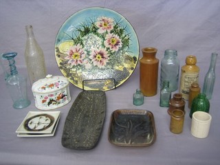 A circular pottery dish with floral decoration 14", a Portuguese porcelain jar and cover and various decorative pottery etc