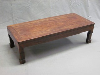 A rectangular Padouk opium table, raised on square supports 41"