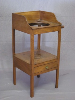 A 19th Century rectangular mahogany wash stand with three-quarter gallery and bowl receptical, having a towel, rail to the side, the base fitted 1 long drawer 16"