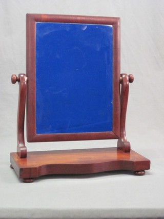 A 19th Century rectangular plate dressing table mirror contained in a mahogany swing frame 17"