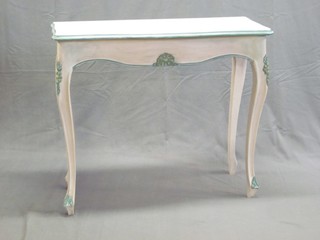 A French style rectangular shaped painted side table, raised on carved cabriole supports 36"