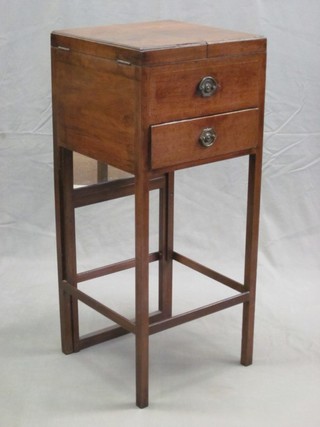 A 19th Century mahogany enclosed wash stand fitted a mirror, the base fitted a drawer and raised on square supports 15"