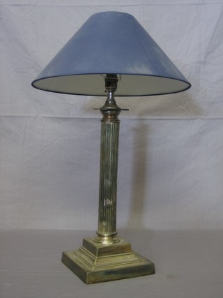 A silver plated reeded table lamp with Ionic capital  15"