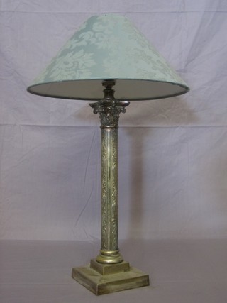A silver plated column table lamp, raised on square base with Corinthian capital 17"