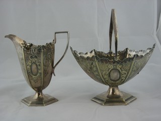 A Victorian embossed silver plated boat shaped cream jug and a matching sugar bowl with swing handle