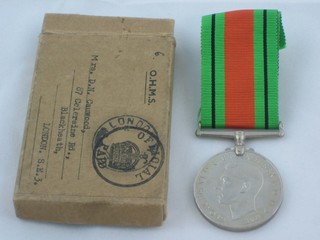 A WWII Defence medal attributable to Mrs D N Canwood