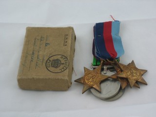 A group of 5 medals attributable to E L Gray comprising 1939-45 Star, Africa Star, Burma Star, Defence and War medal