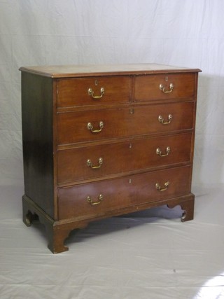 A Georgian mahogany chest of 2 short and 3 long drawers with brass swan neck drop handles, raised on bracket feet 39"