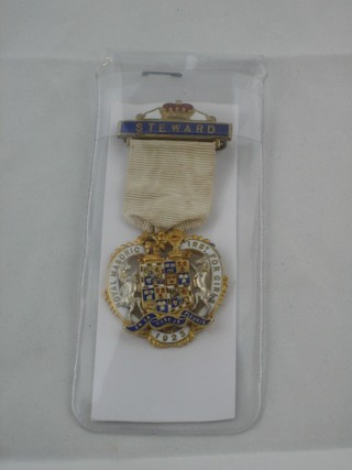 A silver gilt and enamel 1923 RNBI charity jewel