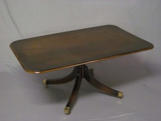 A miniature Georgian style mahogany snap top breakfast coffee  table, raised on pillar and tripod supports ending in brass caps  and castors 48"