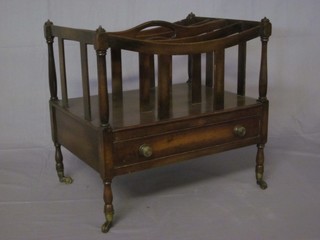 A Georgian style mahogany 4 division Canterbury, the base fitted  a drawer and raised on turned supports 19"