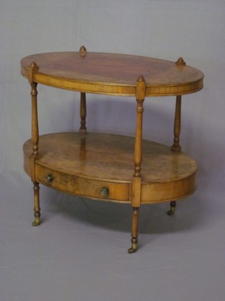 A Georgian style oval figured walnut 2 tier etagere, the base fitted a drawer and raised on turned supports 26"